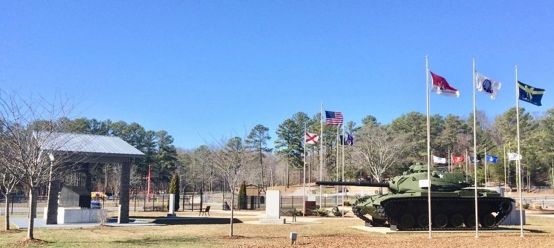 Purple Heart monument below the State of Alabama flag.. Click for full size. Purple Heart monument below the State of Alabama flag. image. Click for full size.