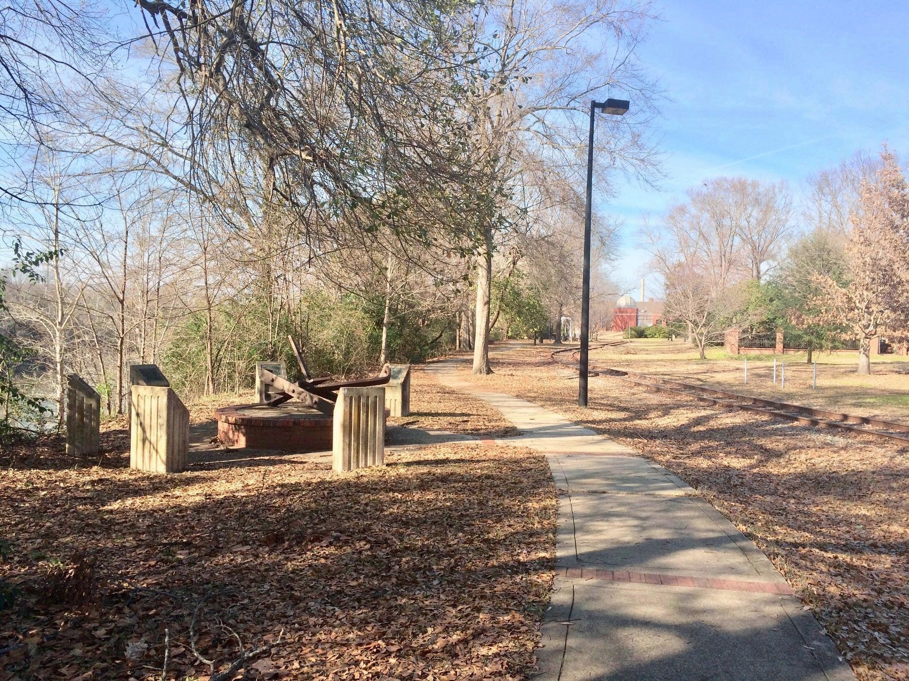 Carson McCullers Marker, on far left, along railroad tracks. image. Click for full size.