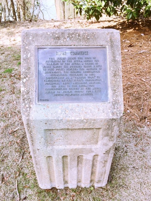 River Commerce plaque on stone. image. Click for full size.