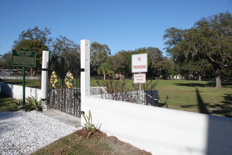 Hillsborough County Historical Cemetery For All People Marker and cemetery behind wall. image. Click for full size.