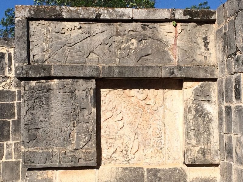 Two prostrate figures (holding staffs), an eagle and a jaguar, as mentioned in the marker text. image. Click for full size.