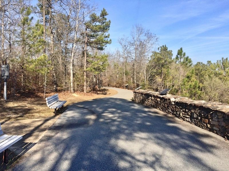 Marker is along path in far background near trees. image. Click for full size.