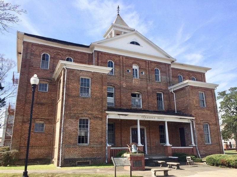 Thrasher Hall with marker and bell in foreground. image. Click for full size.