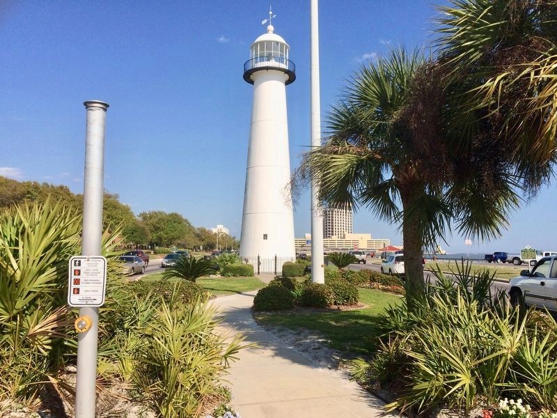 Biloxi Lighthouse with only one metal plaque & a Biloxi Landmark plaque. image. Click for full size.