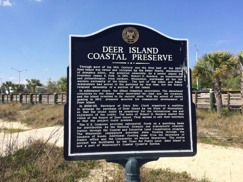 Deer Island Coastal Preserve Marker with parking lot and Beach Boulevard behind. image. Click for full size.