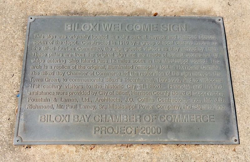 Plaque in the sidewalk below the "Biloxi" sign. image. Click for full size.