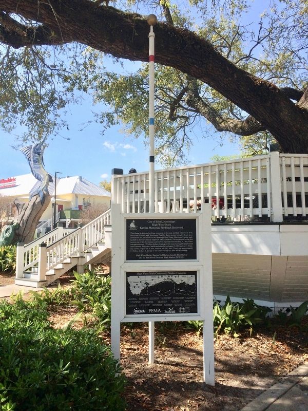 Pole showing the high water marks of hurricanes Katrina & Camille.. Click for full size. Pole showing the high water marks of hurricanes Katrina & Camille. image. Click for full size.