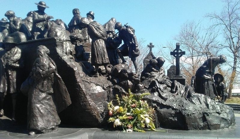 Starvation or Emigration Detail on The Irish Memorial Sculpture image. Click for full size.