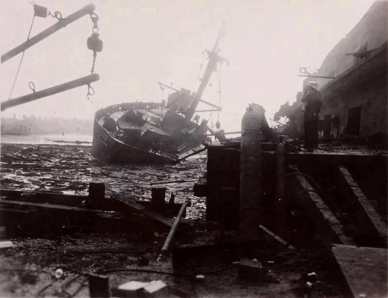 One of the destroyed ships three days after the explosion image. Click for full size.