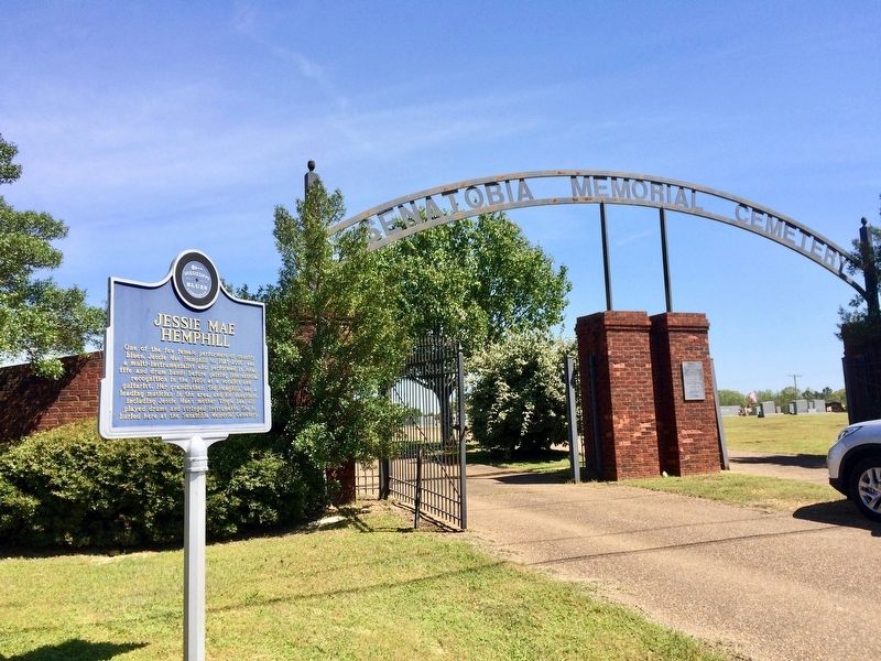 View of marker in front of cemetery. image. Click for full size.