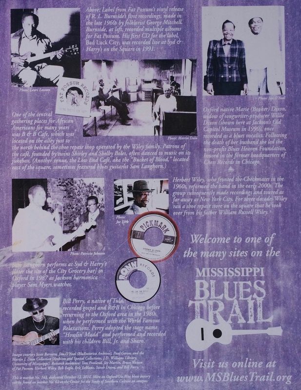 Closeup of photos on reverse side. image. Click for full size.