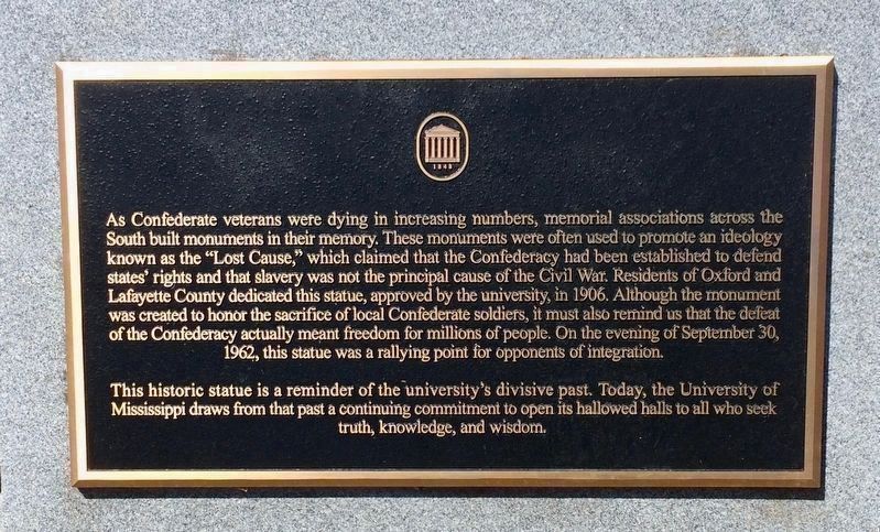 Plaque added in 2016 to "provide context". image. Click for full size.