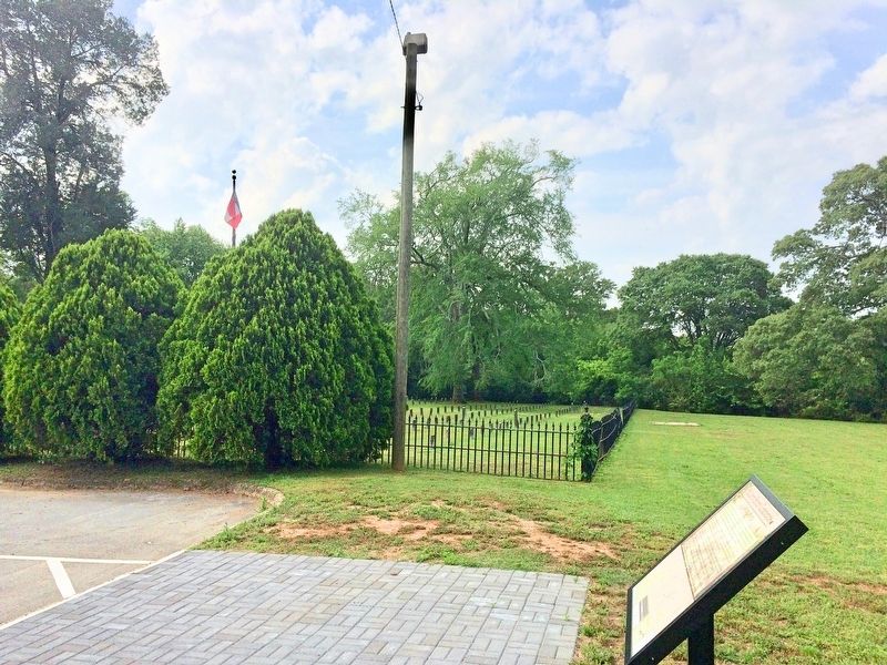 Marker with the Confederate Cemetery to the left. image. Click for full size.