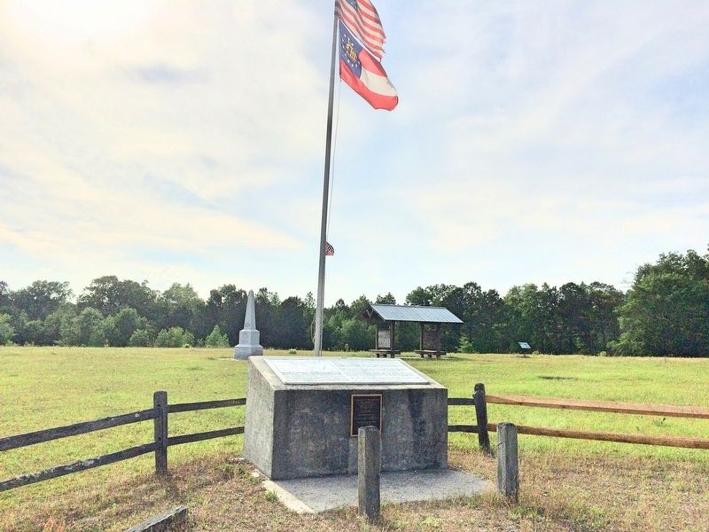 Battle of Griswoldville Marker with newly erected obelisk in background.. Click for full size. Battle of Griswoldville Marker with newly erected obelisk in background. image. Click for full size.