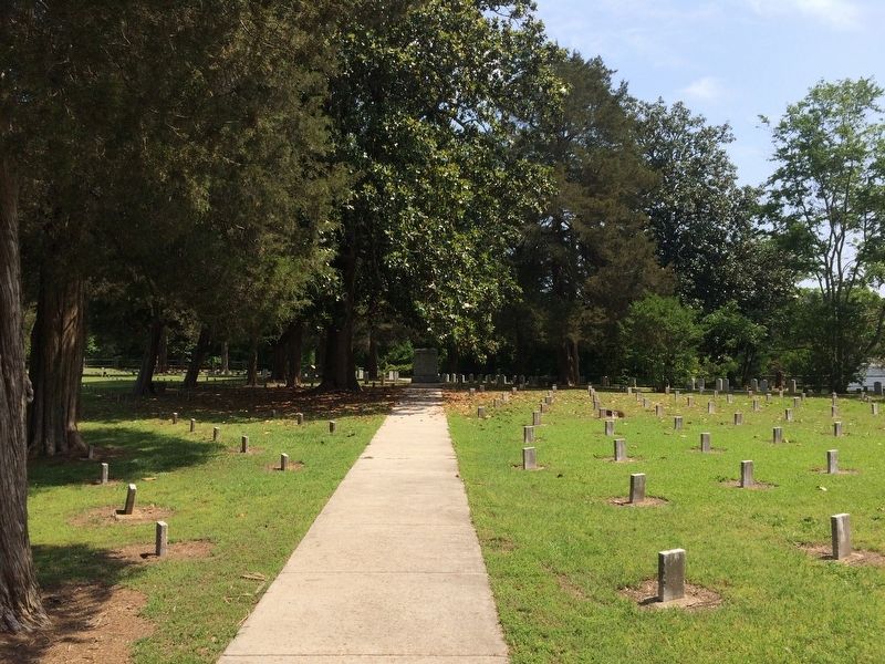 Some of the nearly 1,000 graves in the cemetery. image. Click for full size.