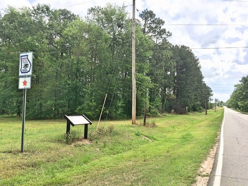 View of marker, looking east on Old Savannah Road, towards 15th Corps campground area. image. Click for full size.