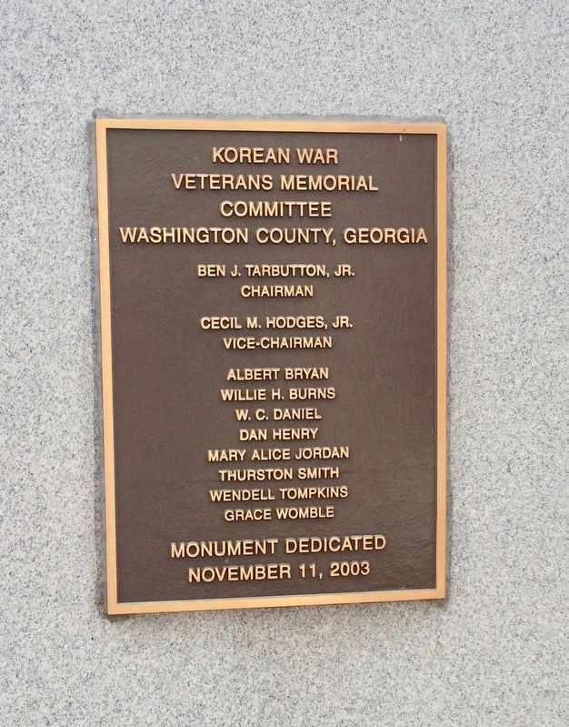 Dedication plaque located on rear of memorial. image. Click for full size.