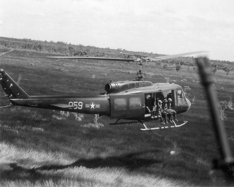 Vietnam Air Force (VNAF) UH-1H lands during a combat mission in Southeast Asia in 1970. image. Click for full size.