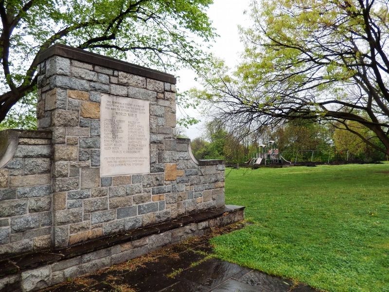 World War II Memorial Marker-Background view showing playground. Click for full size. World War II Memorial Marker-Background view showing playground image. Click for full size.
