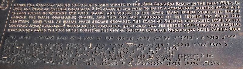 A detail view of the inscription and Braille lettering.. Click for full size. A detail view of the inscription and Braille lettering. image. Click for full size.