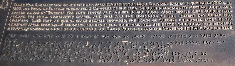 A detail view of the inscription and Braille lettering. image. Click for full size.