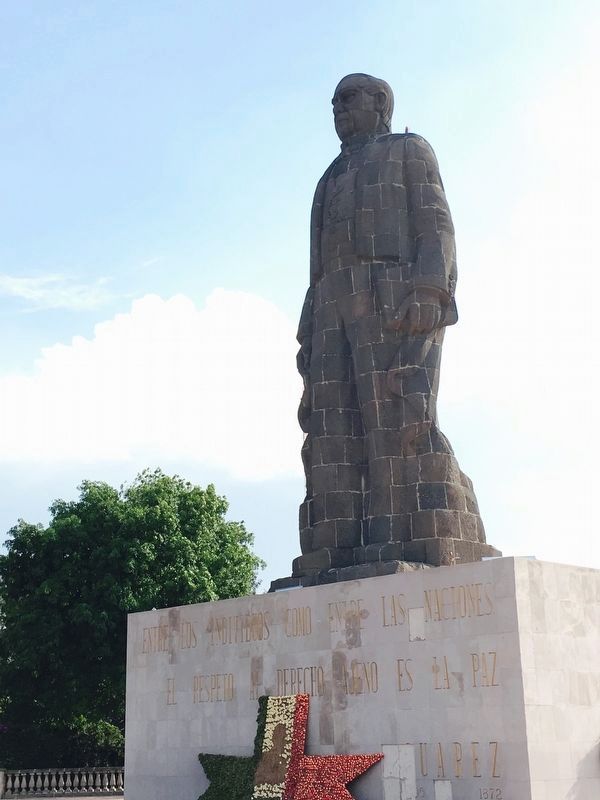 An alternative view of the statue of Benito Juárez at the Hill of the Bells.. Click for full size. An alternative view of the statue of Benito Juárez at the Hill of the Bells. image. Click for full size.