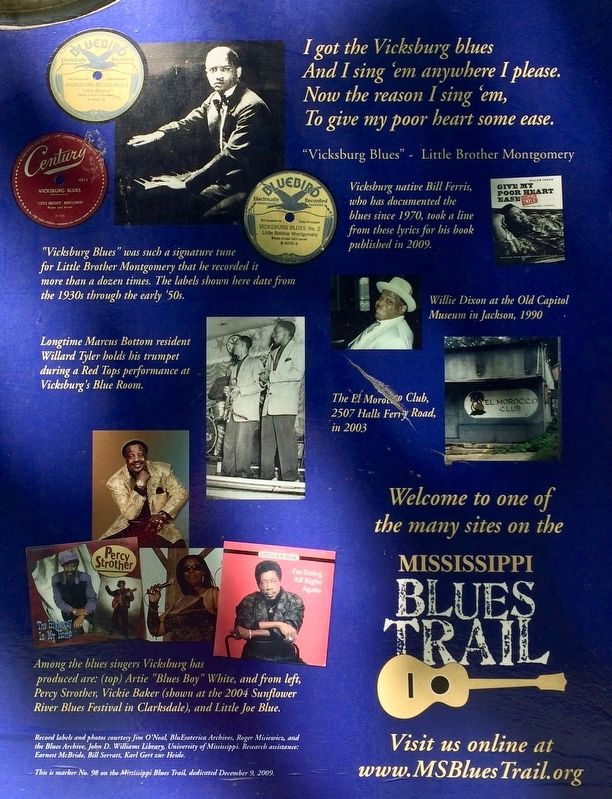 Closeup of the photos on rear of marker.. Click for full size. Closeup of the photos on rear of marker. image. Click for full size.