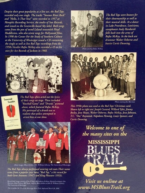 Closeup of photos on rear of marker. image. Click for full size.