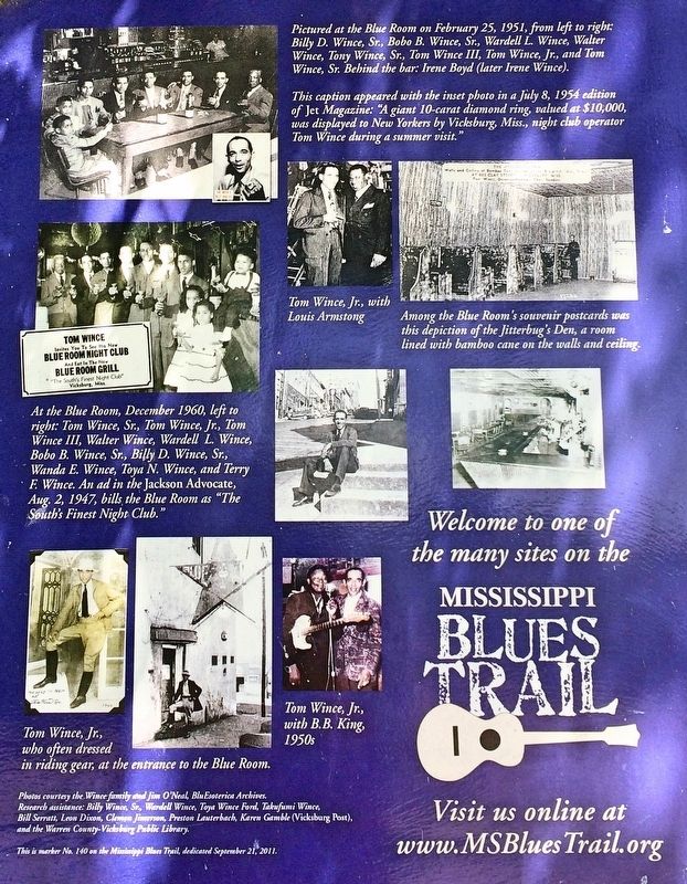 Closeup of photos on rear of marker.. Click for full size. Closeup of photos on rear of marker. image. Click for full size.