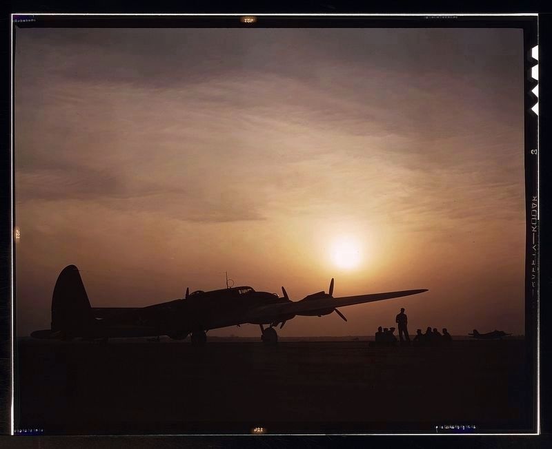 Sunset silhouette of flying fortress, Langley Field, Va. image. Click for full size.