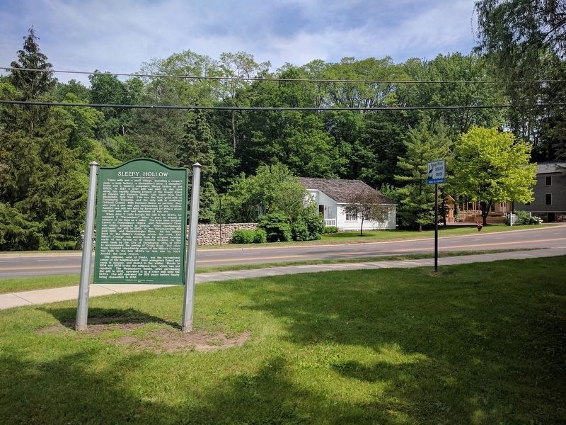 Sleepy Hollow Marker and Miller's Cottage. Click for full size. Sleepy Hollow Marker and Miller's Cottage image. Click for full size.