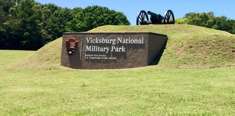 Nearby Vicksburg National Military Park entrance sign.. Click for full size. Nearby Vicksburg National Military Park entrance sign. image. Click for full size.