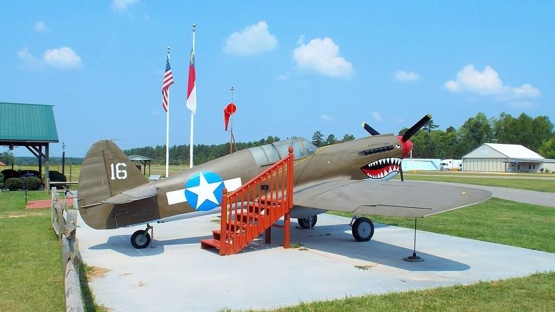 Ret. SFC Zeb D. Harrington and his replica airplane image. Click for full size.