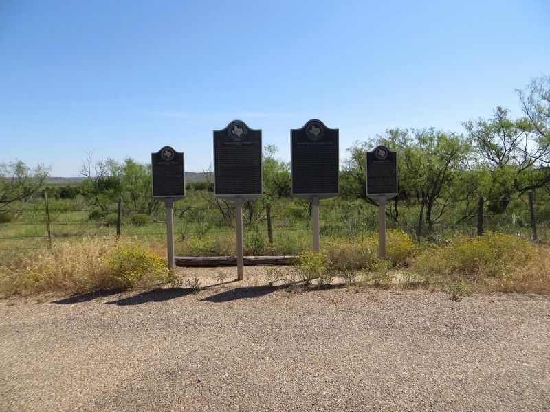 Four historical markers at the intersection of highway US-82 and Farm to Market road 2591. image. Click for full size.