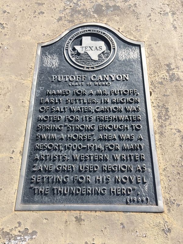 Putoff Canyon Marker. Click for full size. Putoff Canyon Marker image. Click for full size.