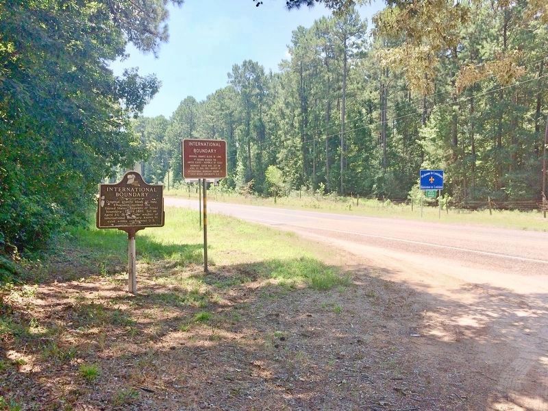 International Boundary Marker and Louisiana/Texas state lines.. Click for full size. International Boundary Marker and Louisiana/Texas state lines. image. Click for full size.