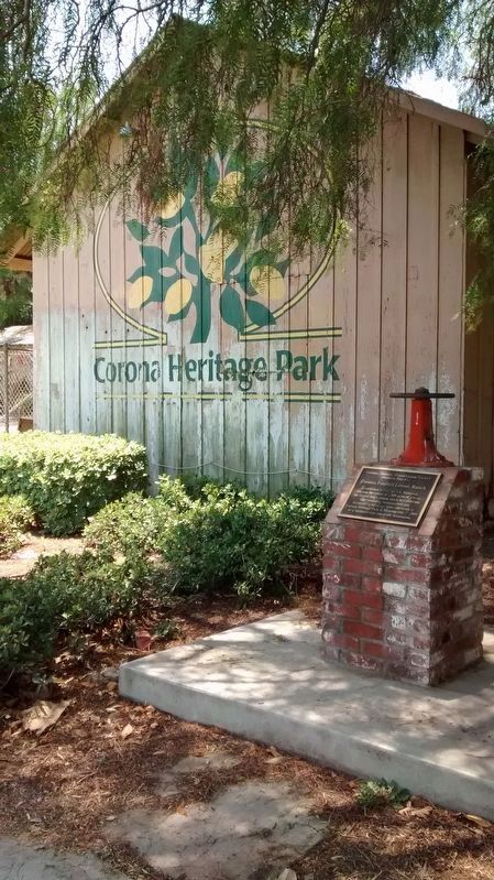 North-facing exterior of Corona Heritage Park ceramic studio building with Marker in foreground. image. Click for full size.