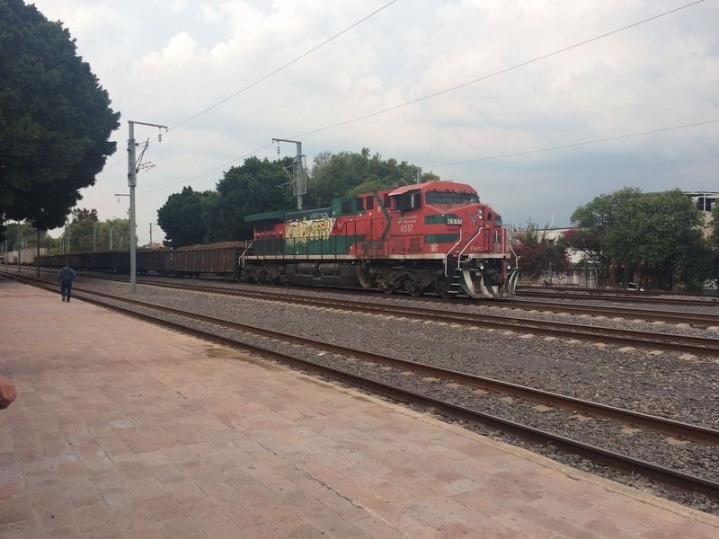A train passing the Querétaro Railroad Station. Click for full size. A train passing the Querétaro Railroad Station image. Click for full size.