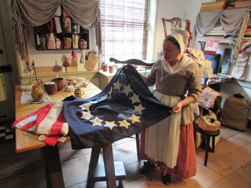 Betsy in her Upholstery Shop image. Click for full size.