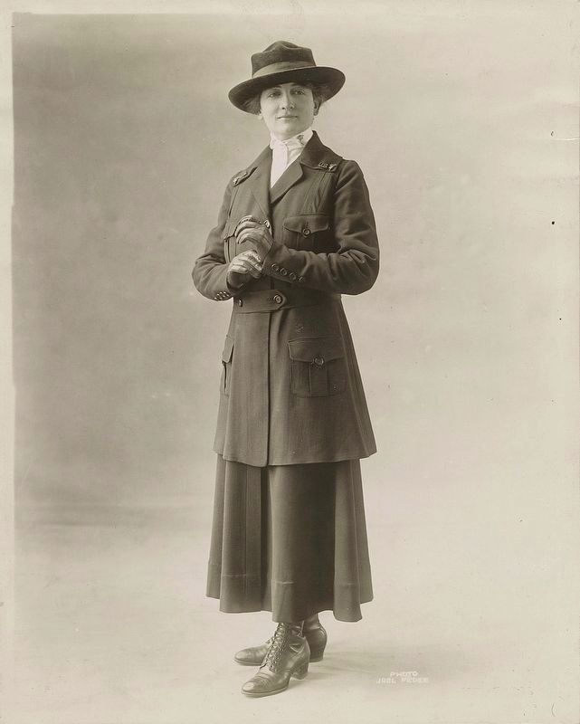 <i>An Army nurse wears the Caduceus, the winged staff and serpent of the Medical Corps...</i> image. Click for full size.