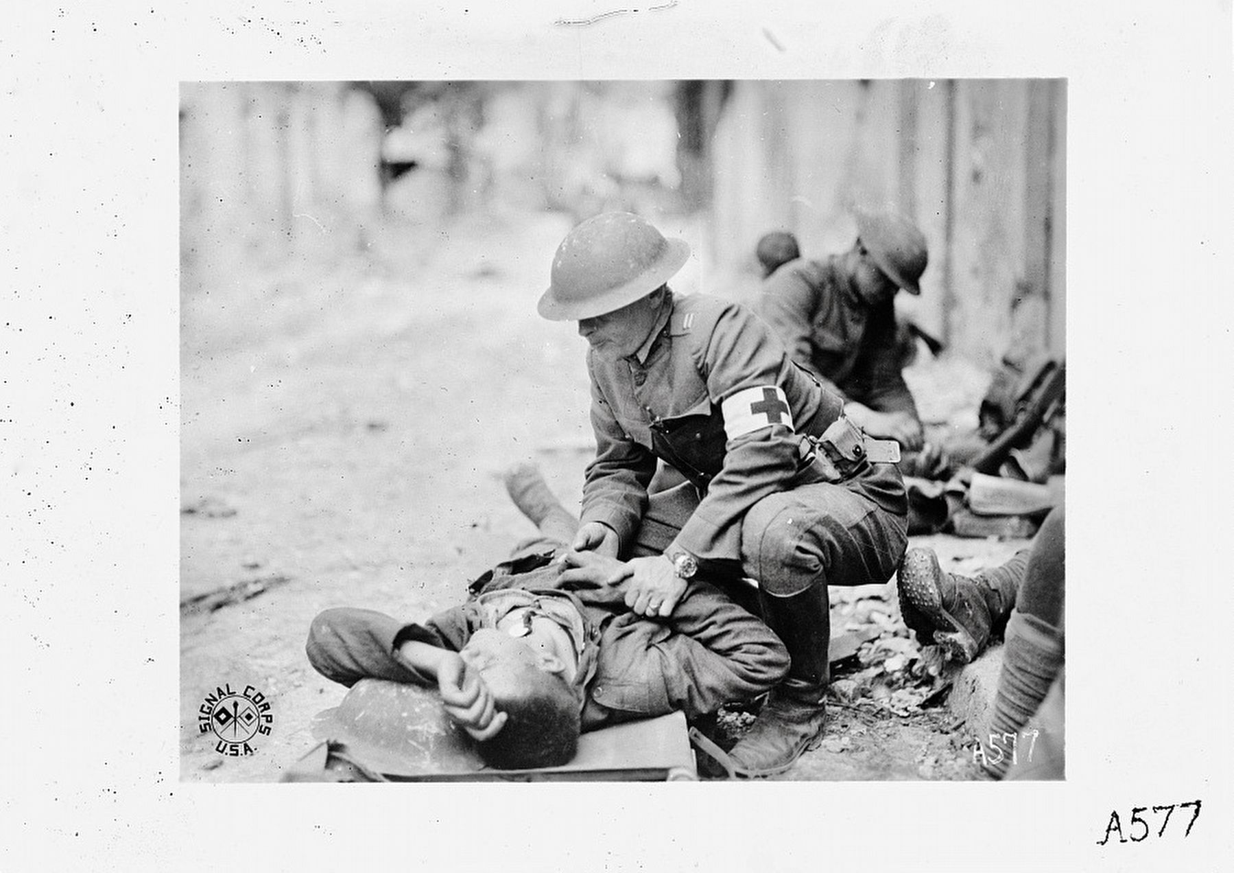 <i>...Giving first aid to the wounded at Chateau Thierry, France....</i> image. Click for full size.
