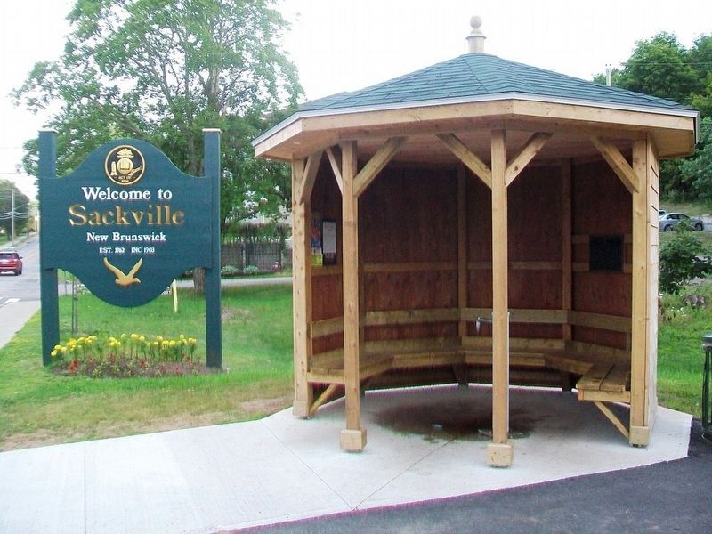 1919 Booster Pump Marker in Artesian Well Shelter image. Click for full size.