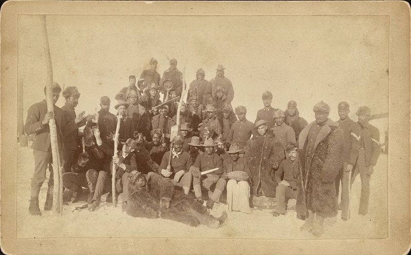 <i>Buffalo soldiers of the 25th Infantry, some wearing buffalo robes, Ft. Keogh, Montana</i> image. Click for full size.