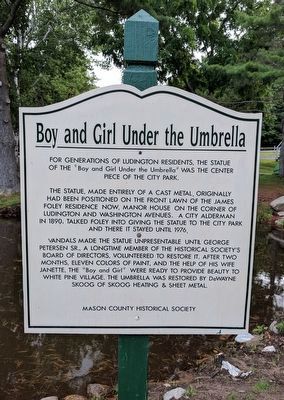 Boy and Girl Under the Umbrella Marker. Click for full size. Boy and Girl Under the Umbrella Marker image. Click for full size.