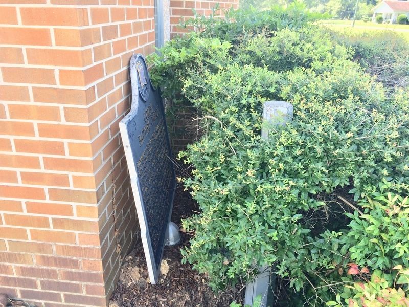 Coker Baptist Church Marker leaning against church wall, next to mounting pole.. Click for full size. Coker Baptist Church Marker leaning against church wall, next to mounting pole. image. Click for full size.