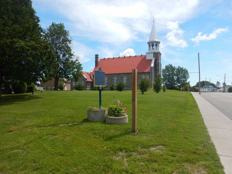 Wideview of The Reverend Charles Alfred Marie Paradis Marker. Click for full size. Wideview of The Reverend Charles Alfred Marie Paradis Marker image. Click for full size.
