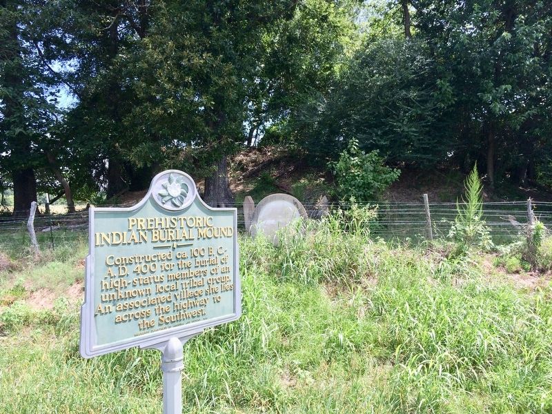 Chickasaw Burial Ground Marker with mound in background.. Click for full size. Chickasaw Burial Ground Marker with mound in background. image. Click for full size.