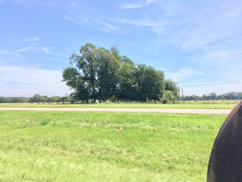 View of two other burial ground markers and a burial mound in distance.. Click for full size. View of two other burial ground markers and a burial mound in distance. image. Click for full size.
