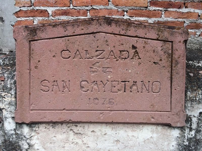 A nearby sign noting that the road is the Saint Cajetan Road of 1876 image. Click for full size.