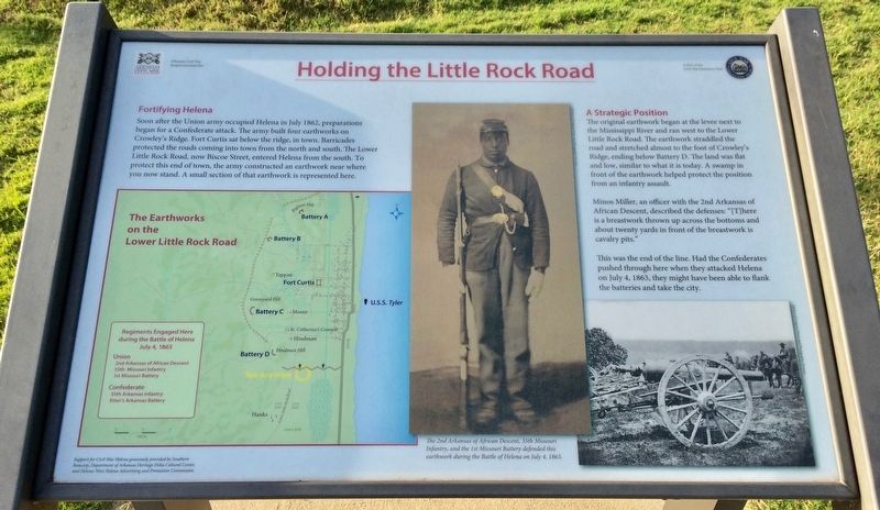 Holding the Little Rock Road Marker image. Click for full size.